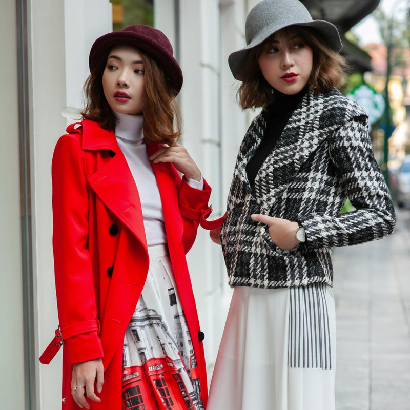 A person posing in trendy streetwear for a modern urban aesthetic.